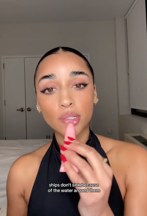 Creators apply lip gloss to grab your eye.