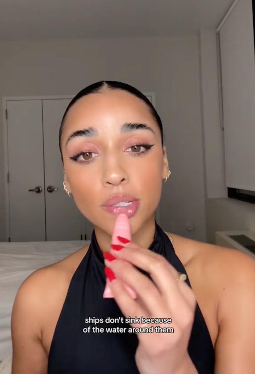 Creators apply lip gloss to grab your eye.