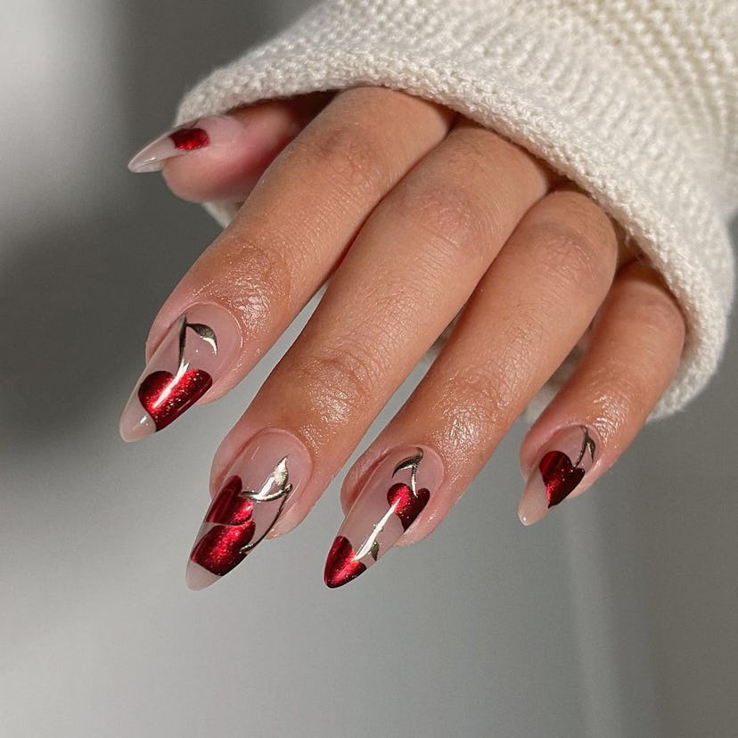 Nails with heart-shaped chrome cherries are on-trend.