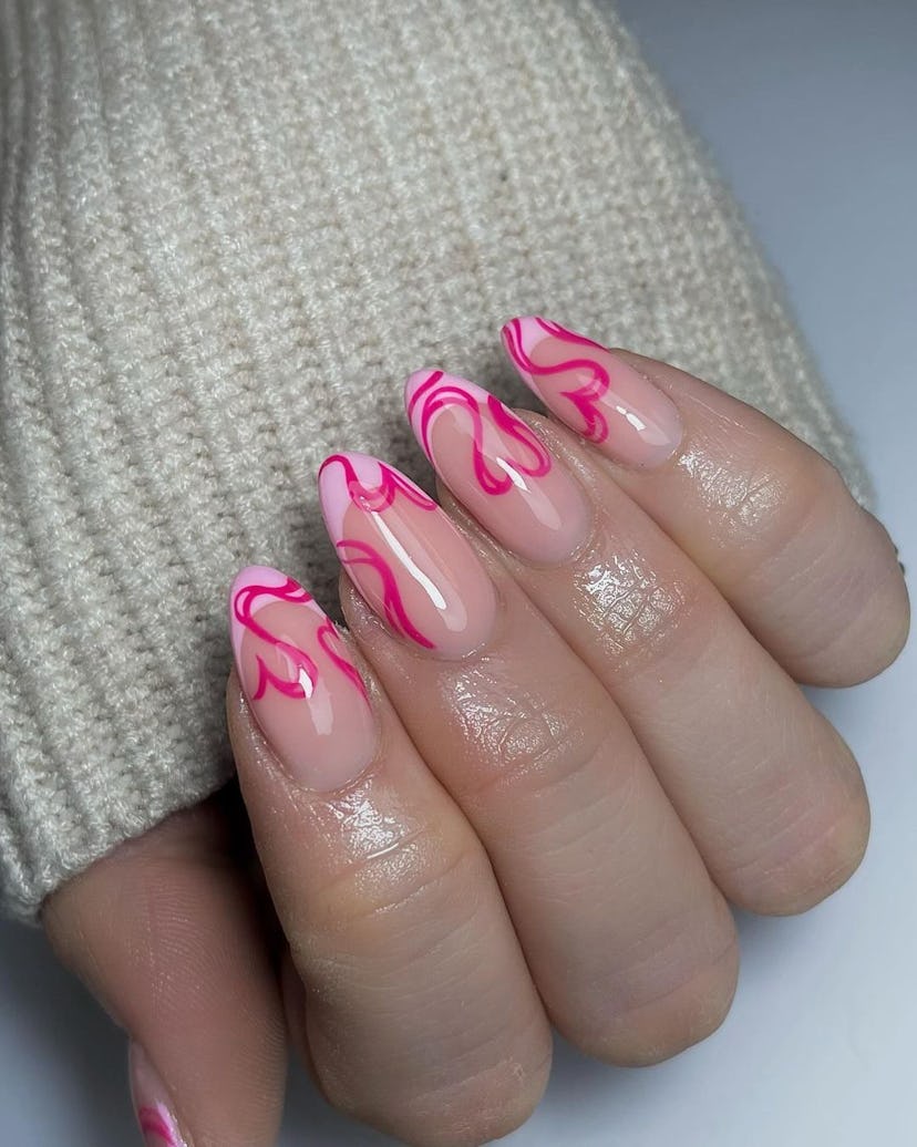 Nails with abstract heart designs are on-trend.