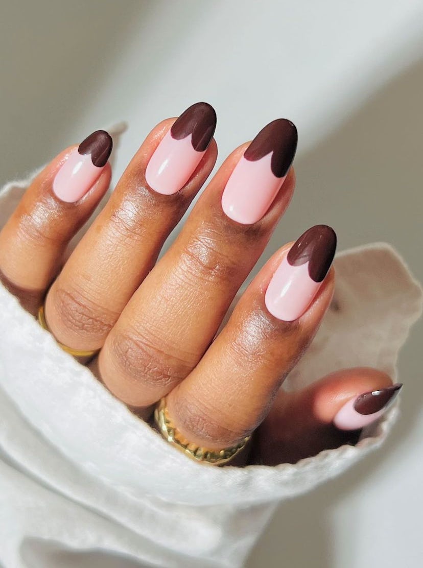 Heart-shaped French tip nails are on-trend.