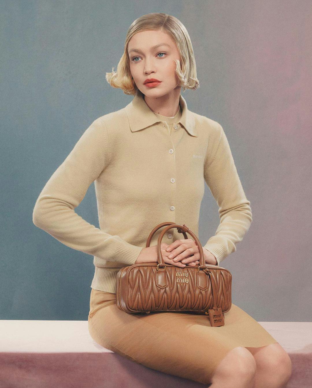 Gigi Hadid stars in a 2024 Bag Campaign for Miu Miu.  