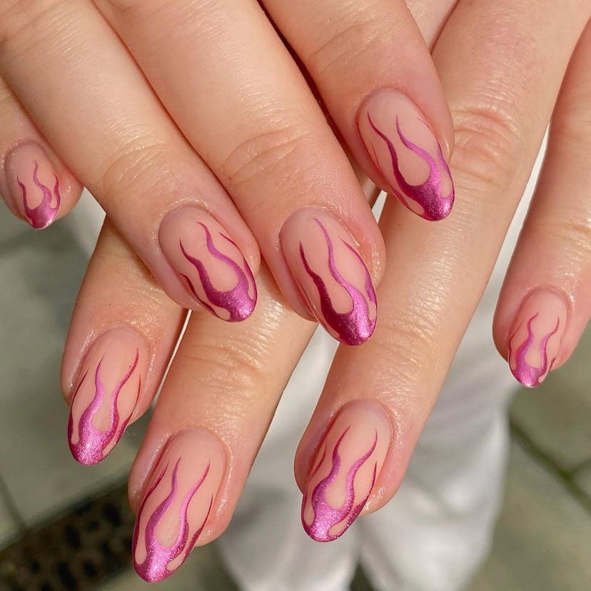 Pink metallic flame nails are on-trend for 2024.