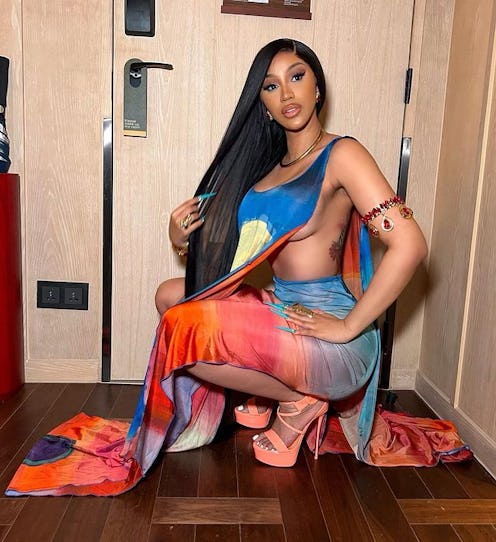 Cardi B side part bussdown