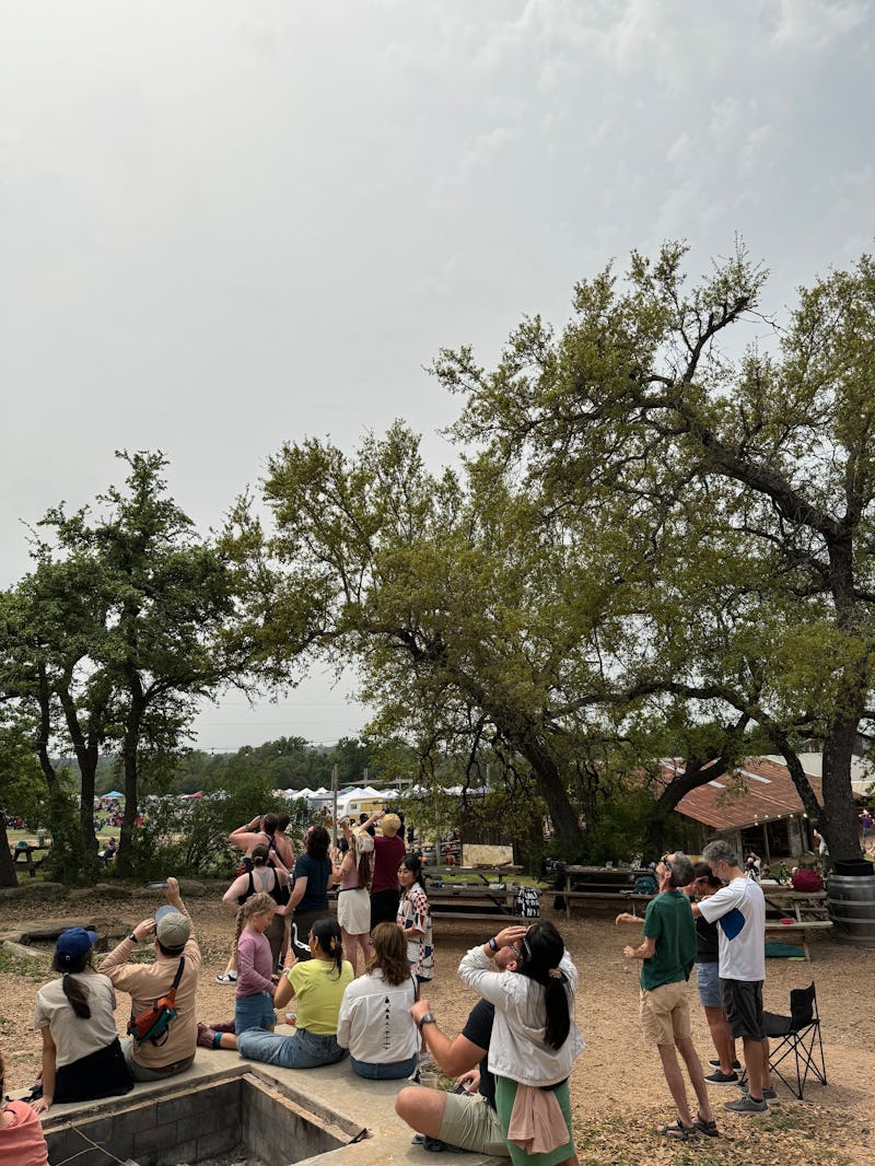 a group of solar eclipse watchers in Austin, Texas