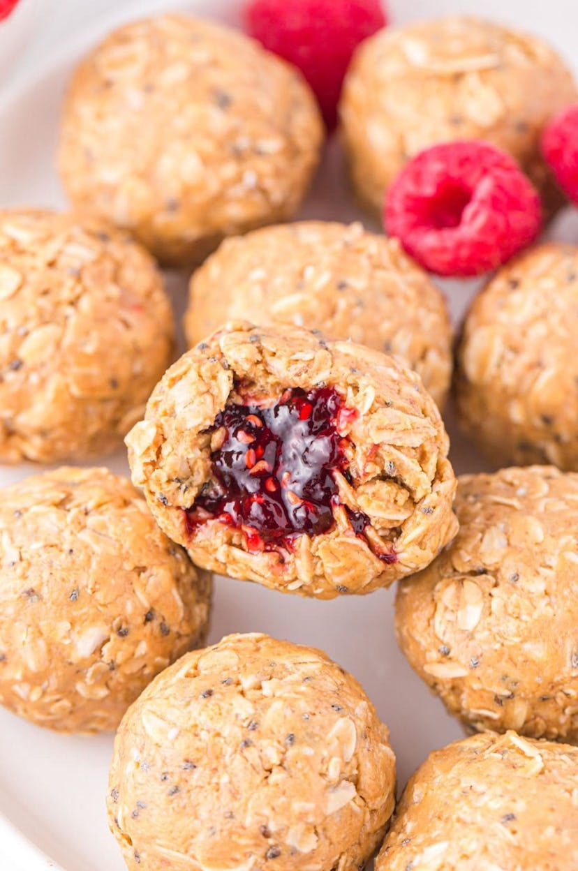 One of the easiest make-ahead snacks for toddlers are peanut butter and jelly energy balls.