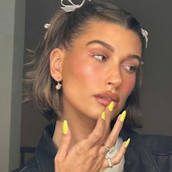 hailey bieber neon yellow nails