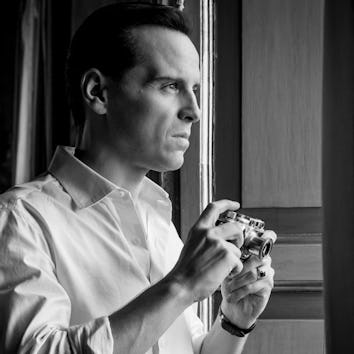 Andrew Scott holds a camera in 'Ripley'