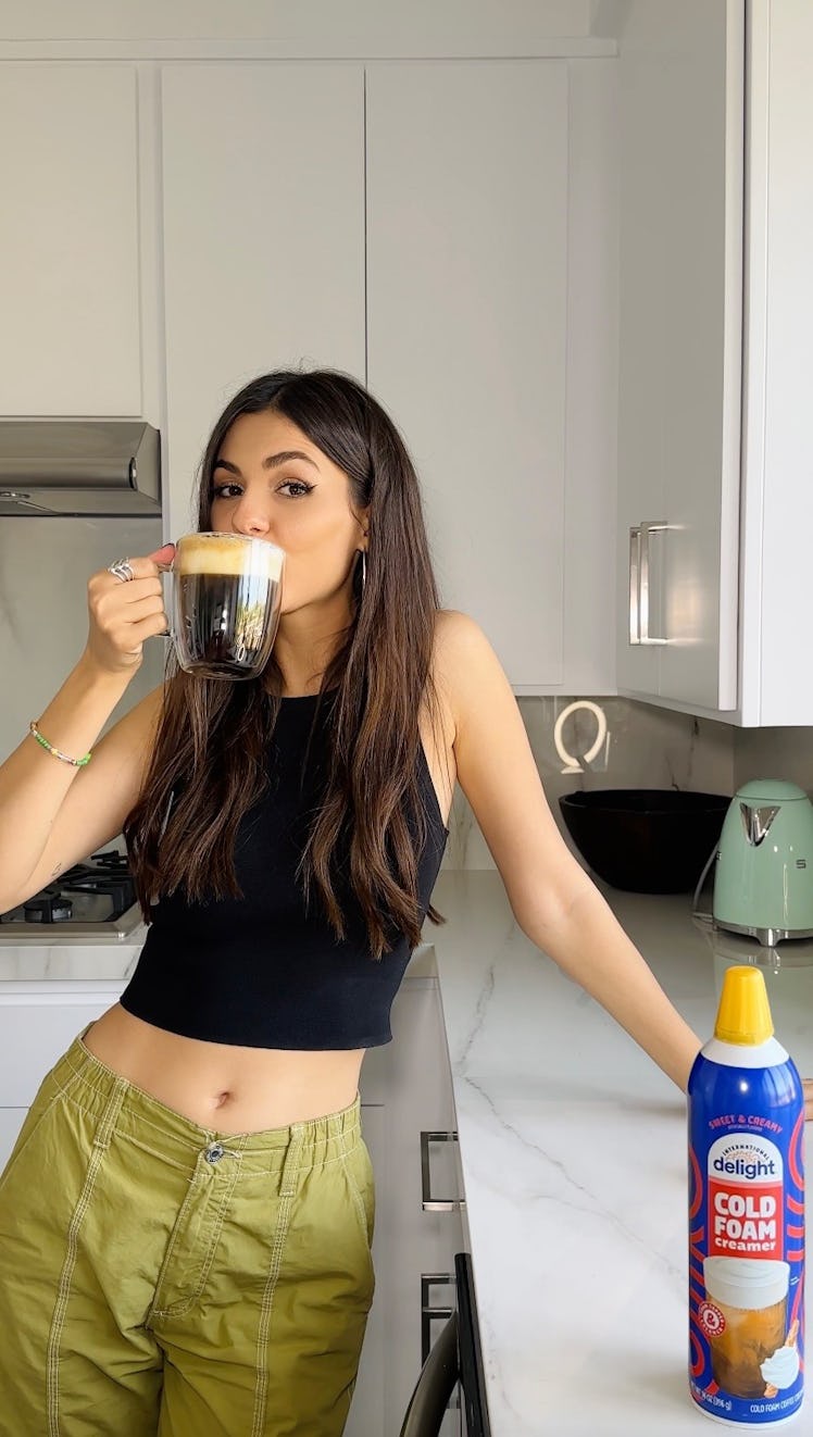 Victoria Justice starts her day at Coachella with coffee for breakfast. 