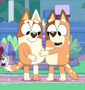 Brandy and Chilli from 'Bluey' greet each other. Chilli rubs Brandy's pregnant belly.