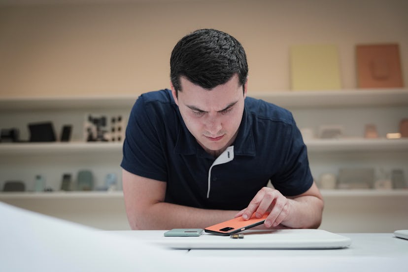 Isaac Reynolds, Group Product Manager for Google’s Pixel Camera, looking at the camera module on a P...