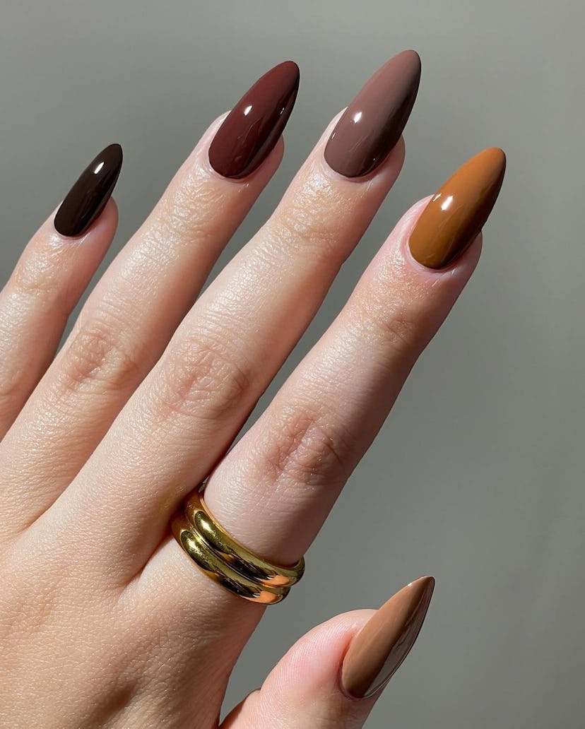 Try brown Skittle nails for Taurus season 2024.