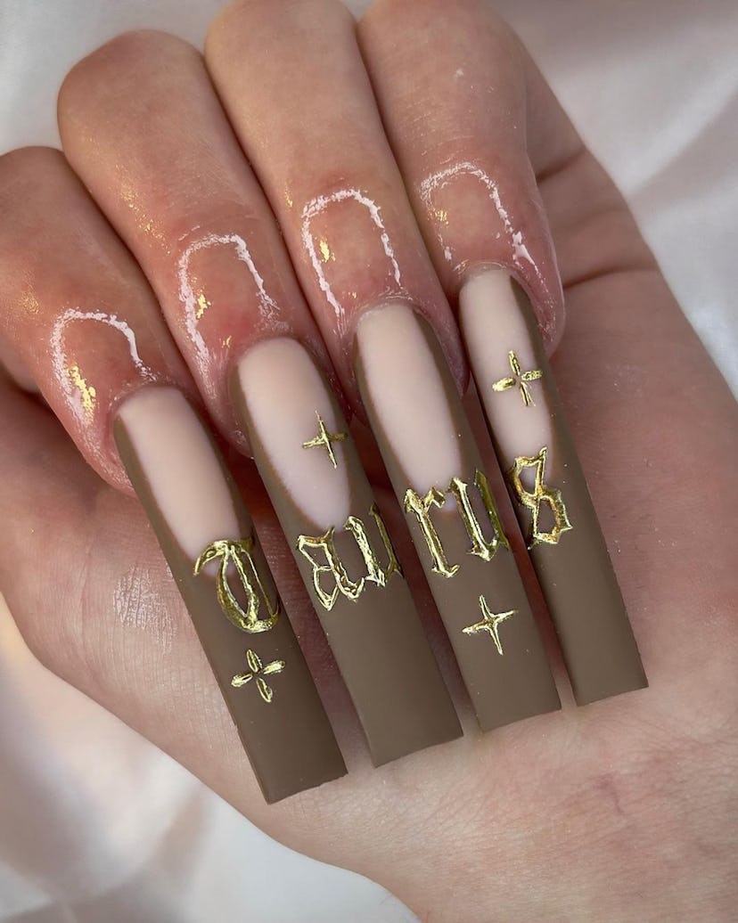 Try extra-long nails with the word "Taurus" spelled on them for Taurus season 2024.