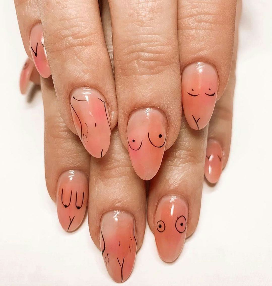 Fine line feminine nail art motifs are on-trend.