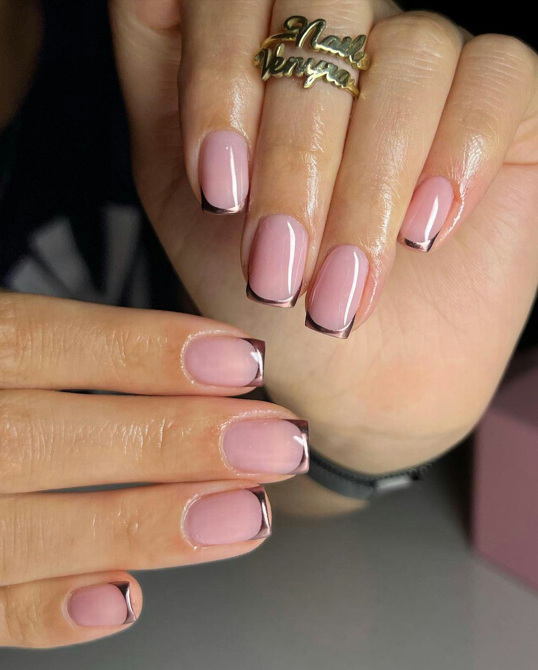 Try a bronze micro French tip manicure for Taurus season 2024.