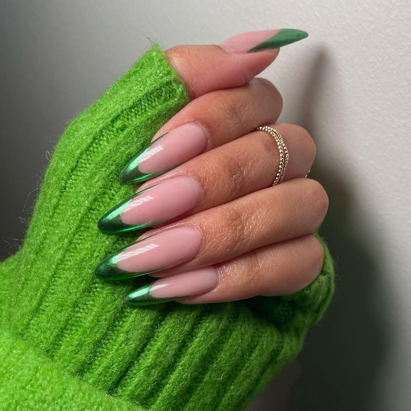 Try green chrome French tip nails for Taurus season 2024.
