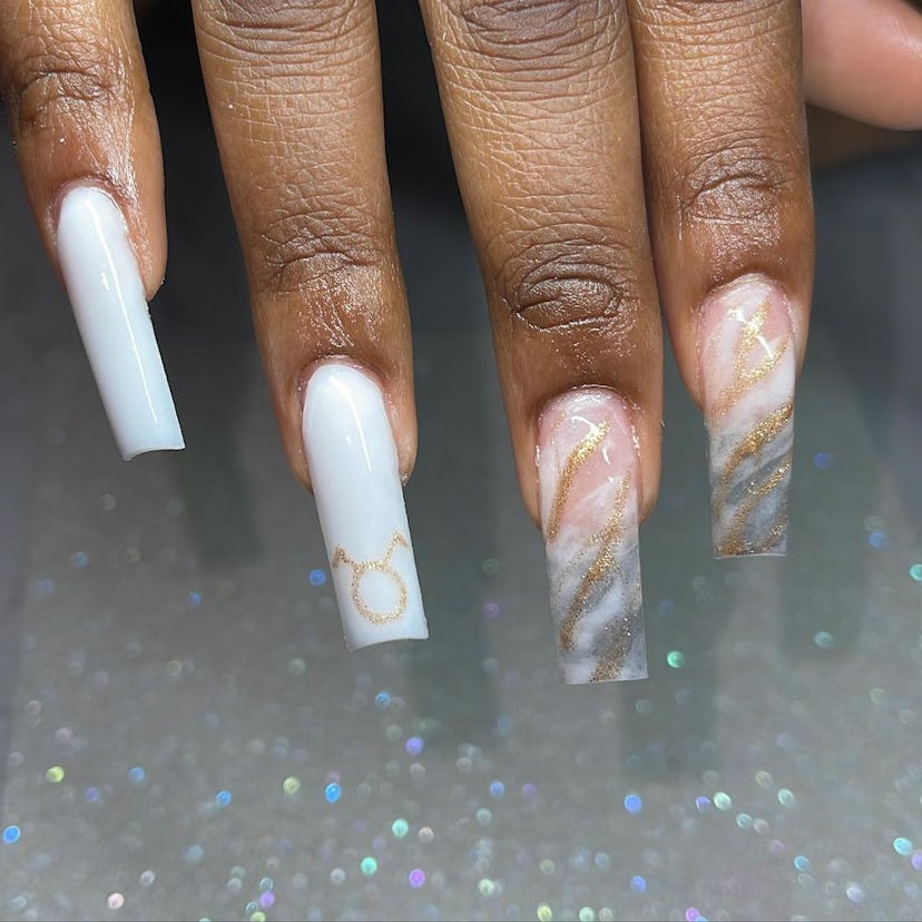 Try white marbled nails for Taurus season 2024.