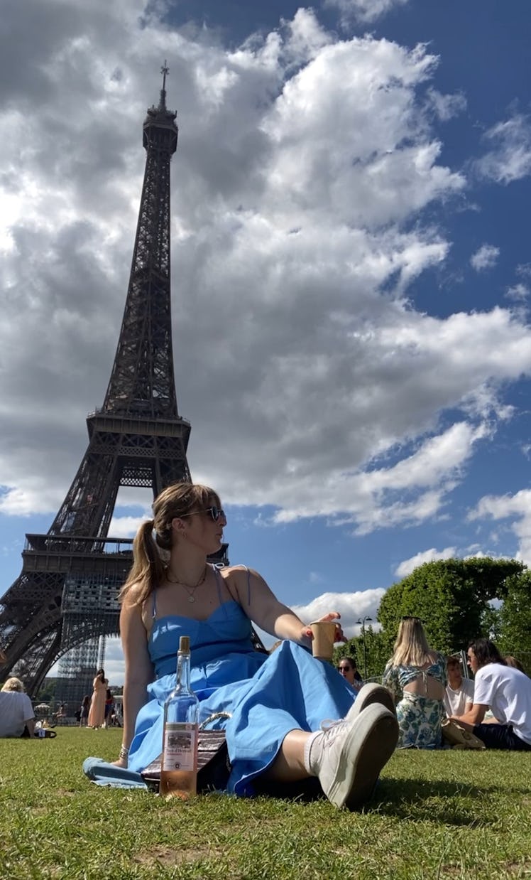 Alana Bracken picnicking at the Eiffel Tower.