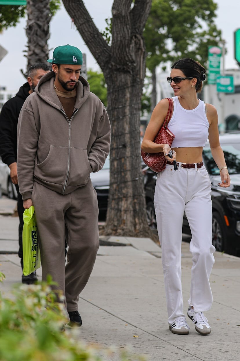 Bad Bunny and Kendall Jenner carrying the Goyard Saint Louis bag.