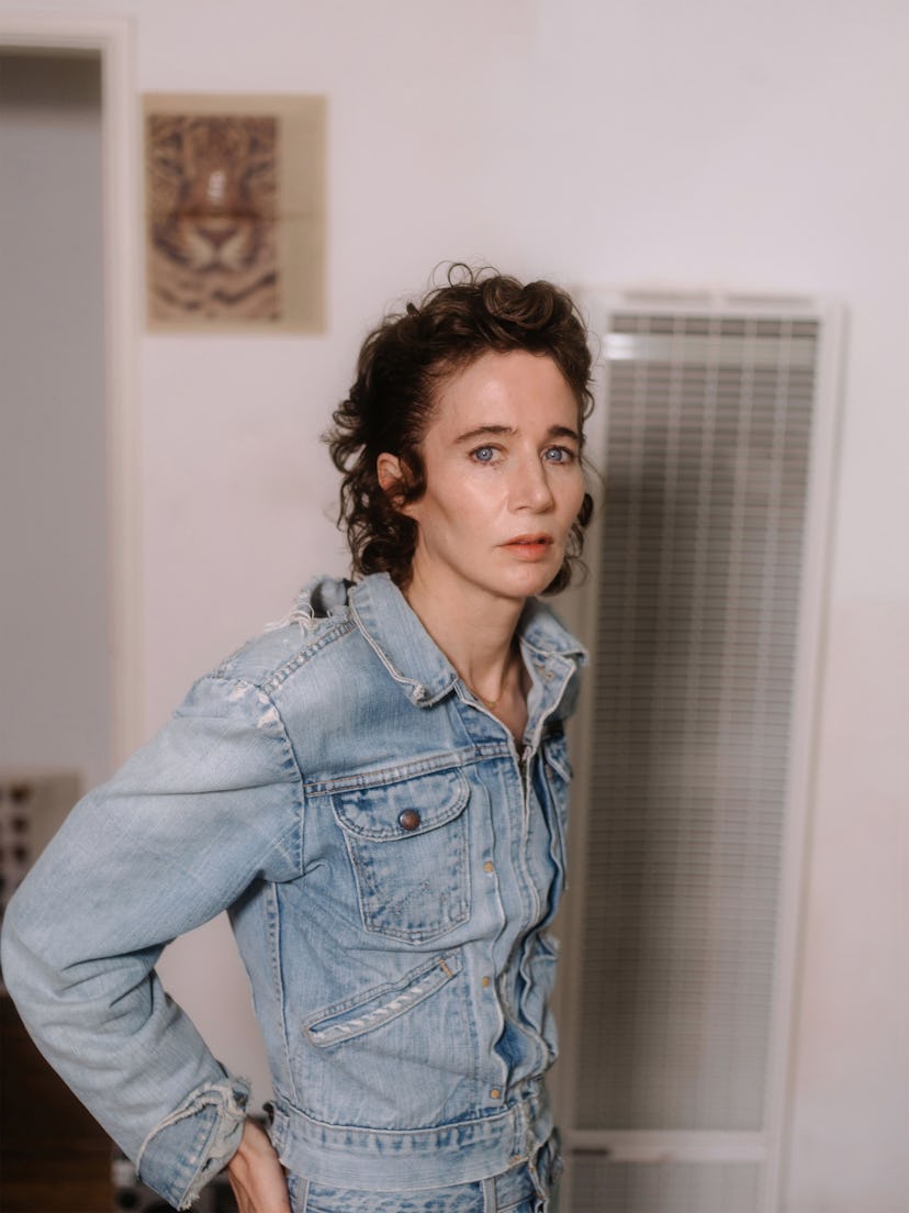 A portrait of Miranda July wearing a jean jacket.