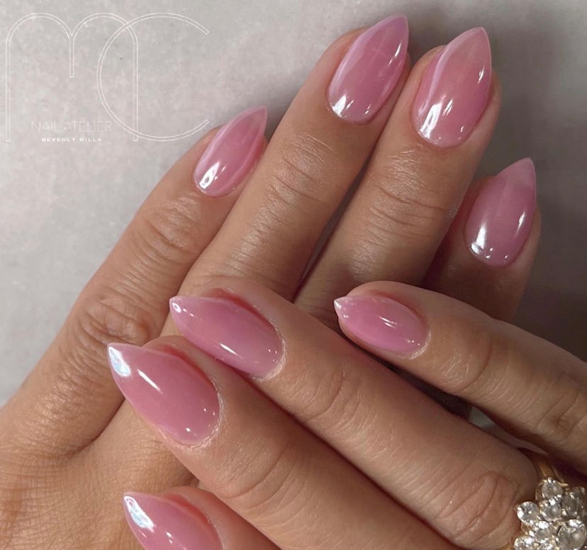 Jellyfish pink nail polish is on-trend for summer 2024.