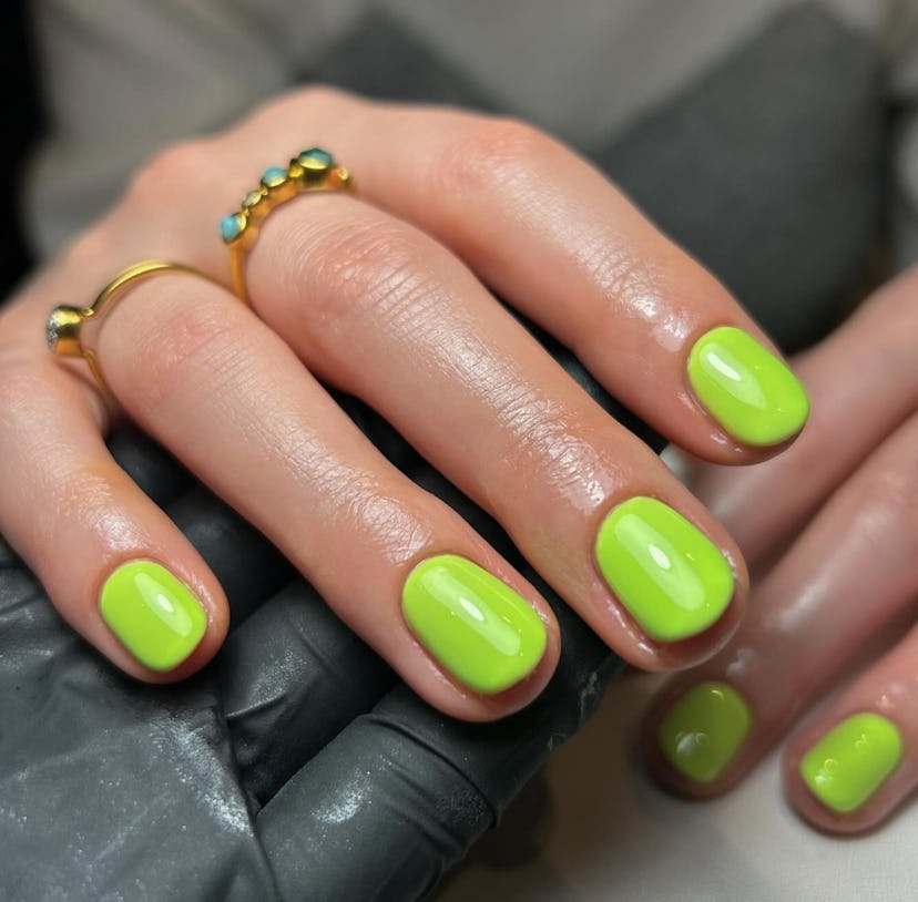 Lime nail polish is on-trend for summer 2024.