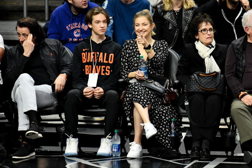 Kate Hudson and her son Ryder Robinson attend a basketball game between the Los Angeles Clippers and...