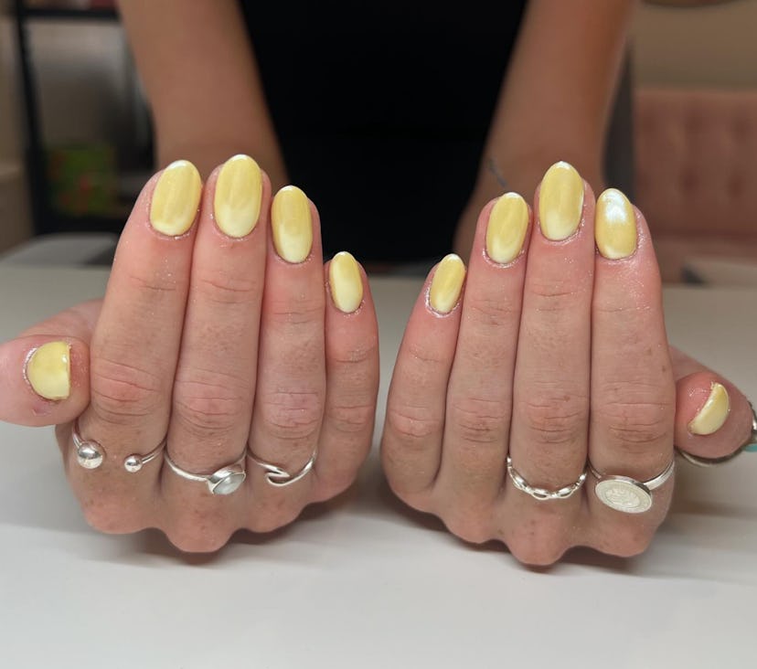 Lemon nail polish is on-trend for summer 2024.