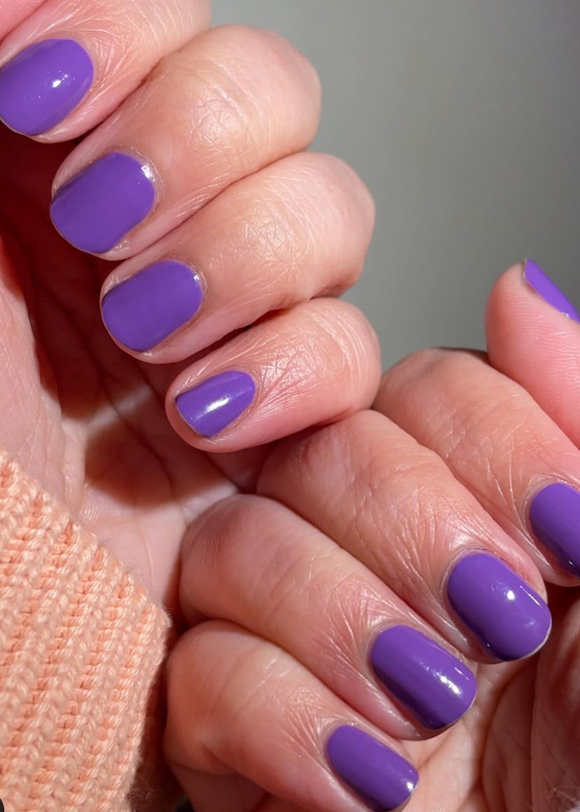 Purple nail polish is on-trend for summer 2024.