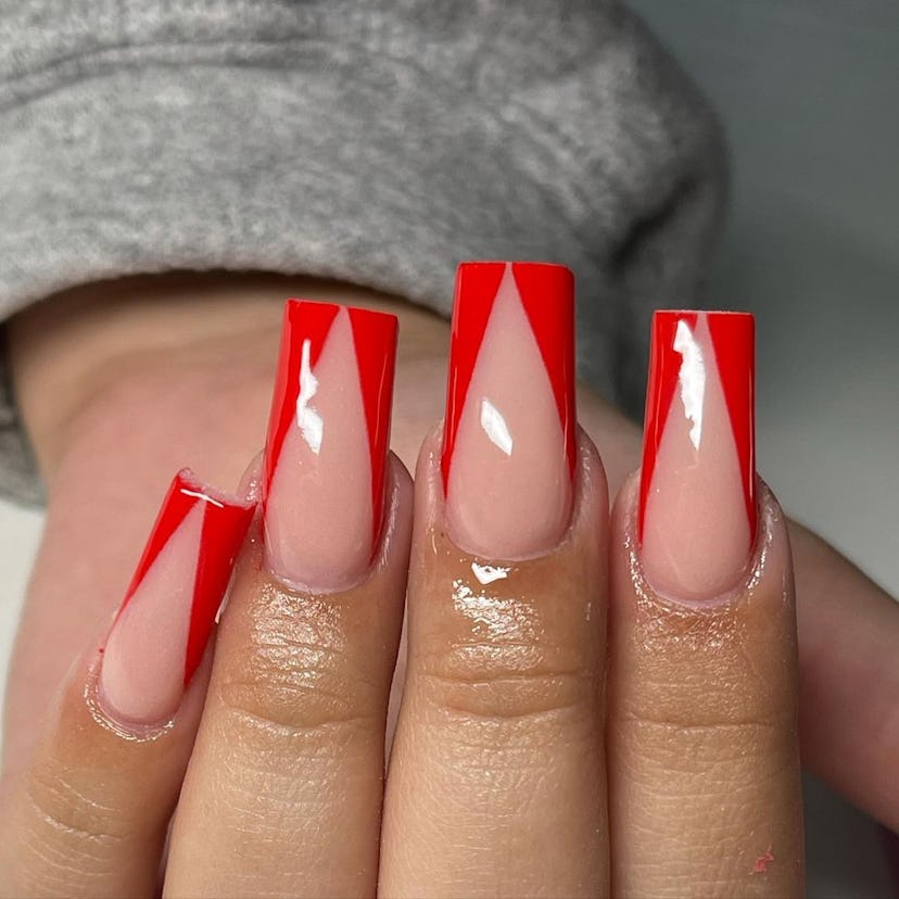 V-tip red French nails are on-trend.