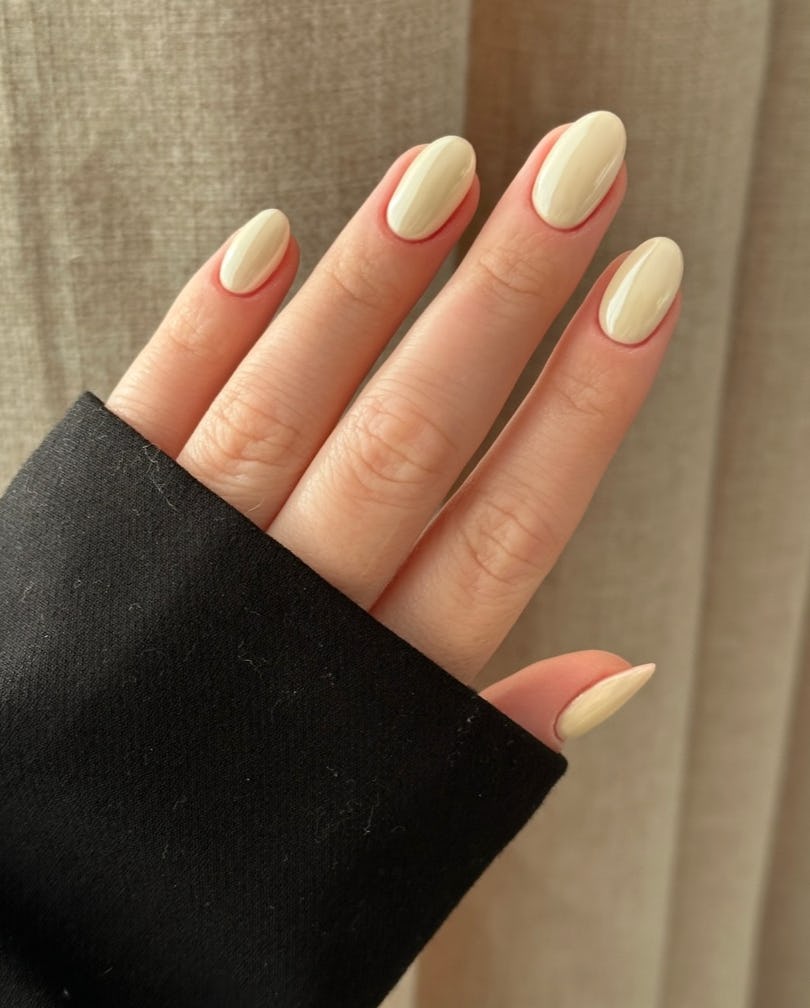 Vanilla cream nail polish is on-trend for summer 2024.