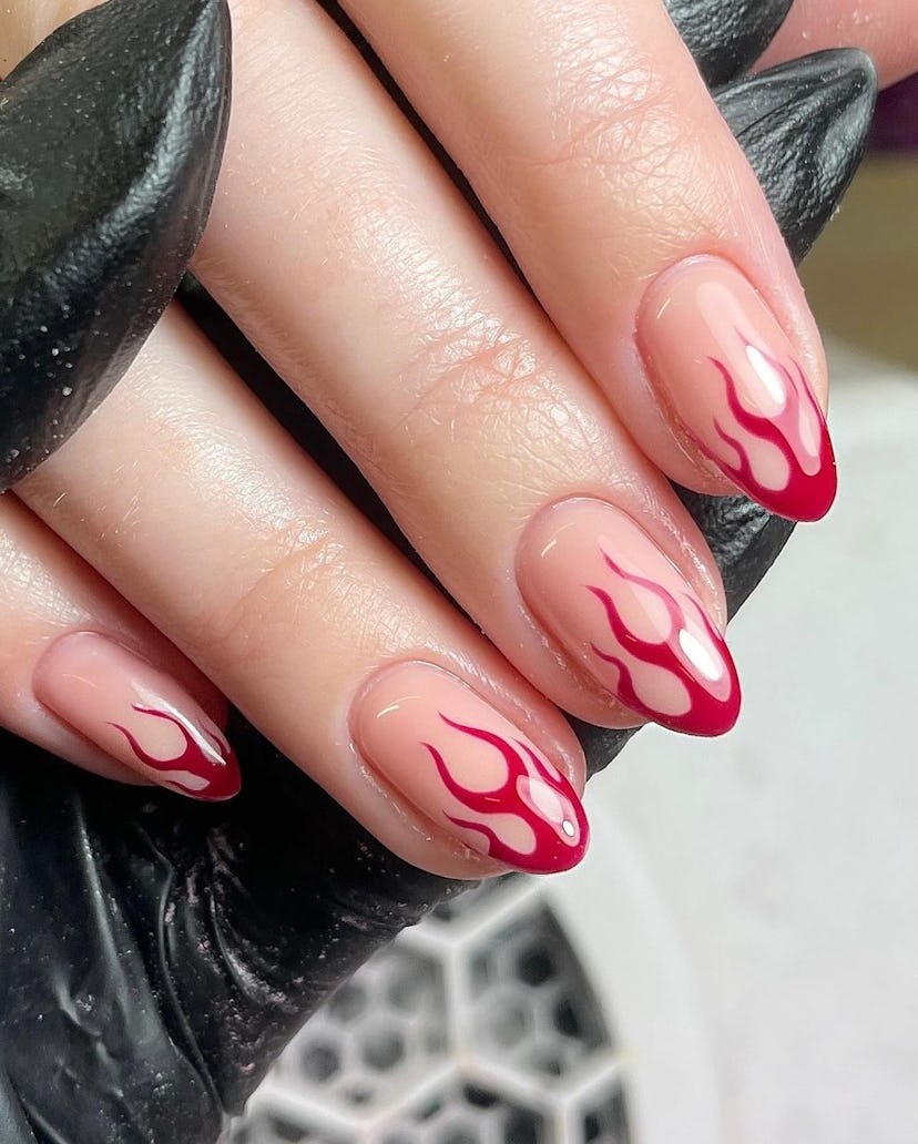 Red flame French tip nails are on-trend.