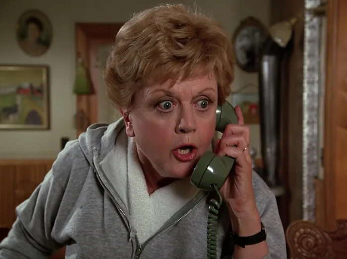 Angela Lansbury as Jessica Fletcher talks on a green phone in 'Murder, She Wrote.'