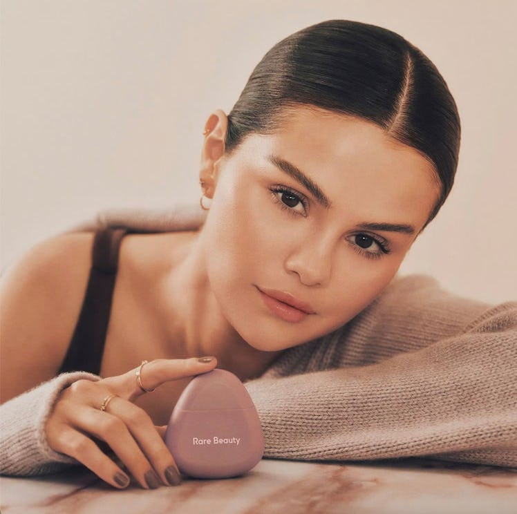 Selena Gomez with Rare Beauty's hydrating hand cream from the Find Comfort Collection.