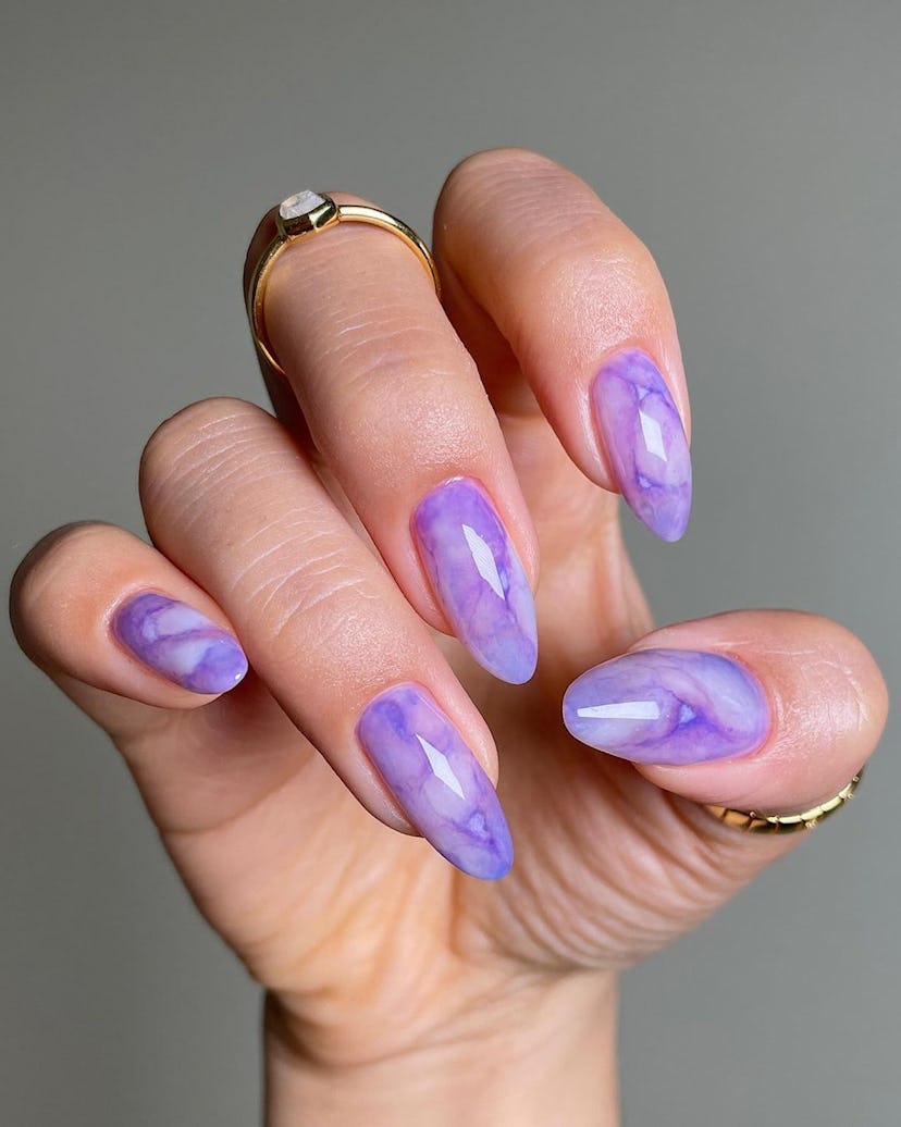 Purple amethyst nails are on-trend.