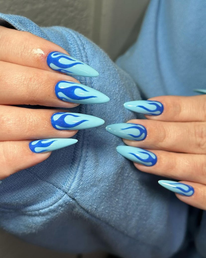 Blue flame nail designs are on-trend.