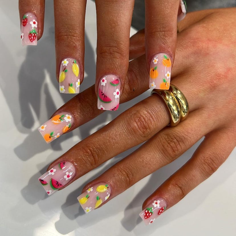 Colorful fruit pattern nail designs are on-trend.