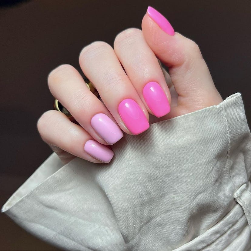Two-tone pink nails are on-trend.