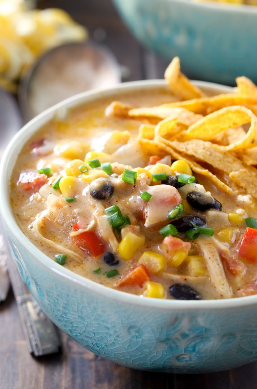A cheesy dinner recipe to make is slow cooker cheesy Mexican chipotle corn chowder.