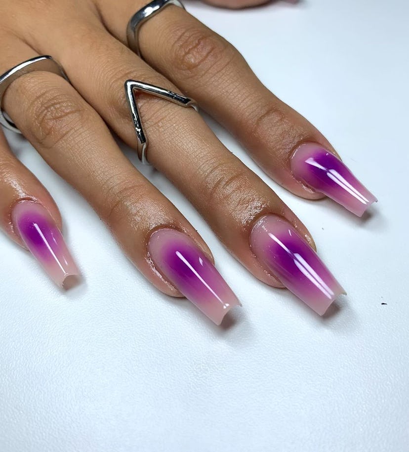 Purple aura nails are on-trend.