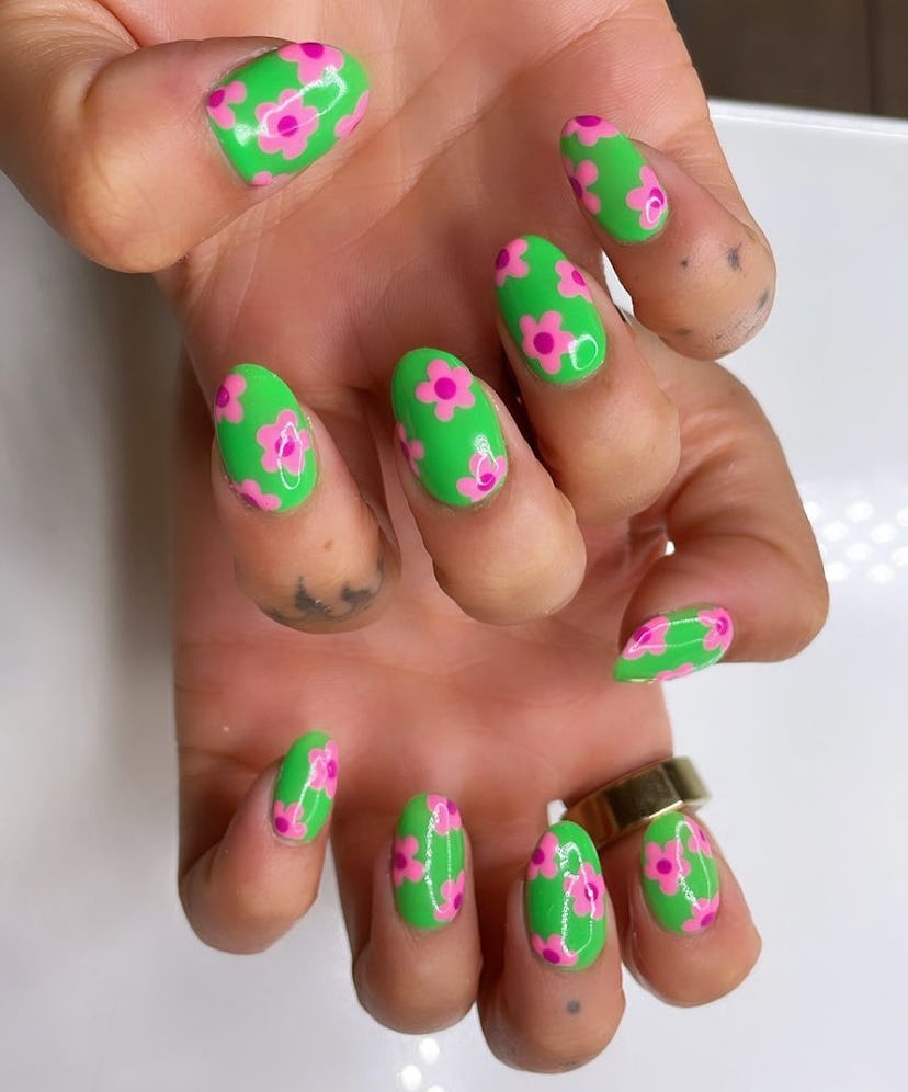 Vibrant flower print nails are on-trend.