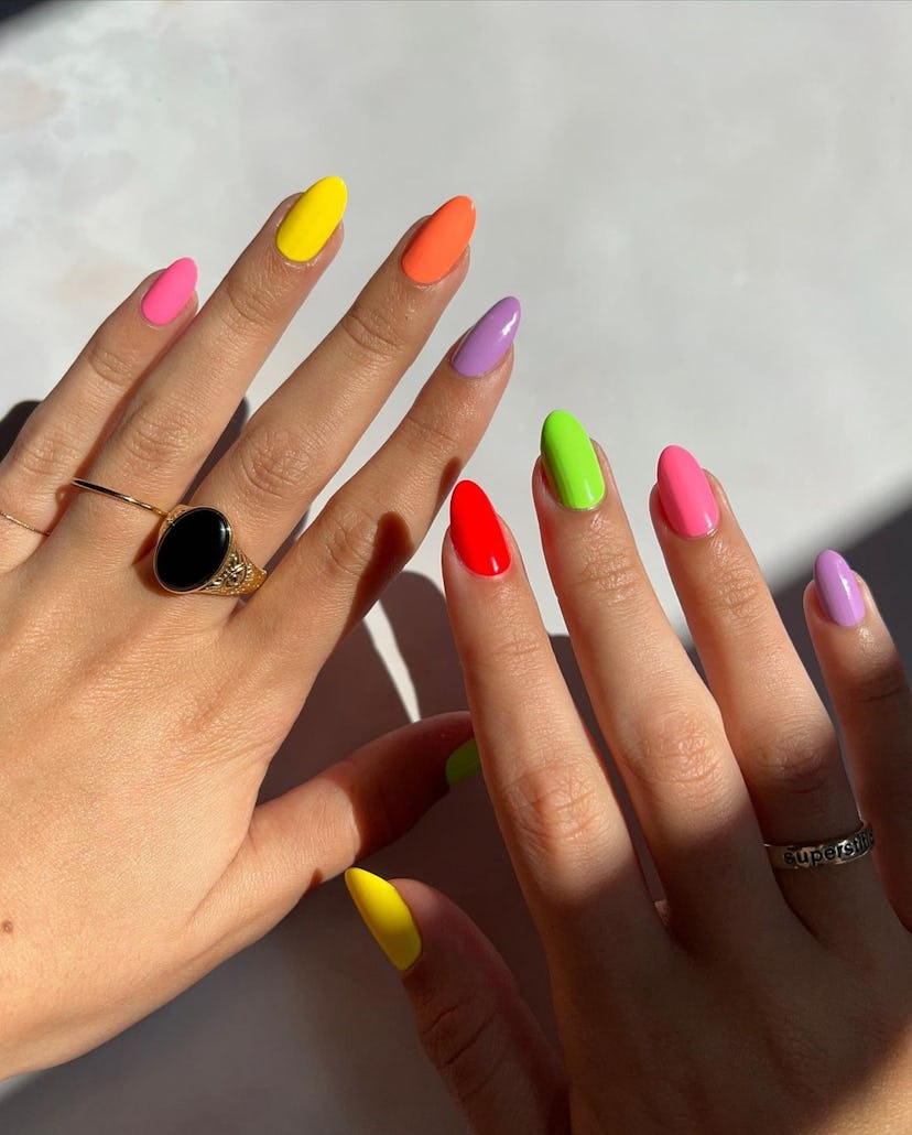 Bright Skittle nails are on-trend.
