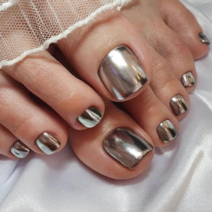 Chrome pedicures are on-trend for Taurus season 2024.