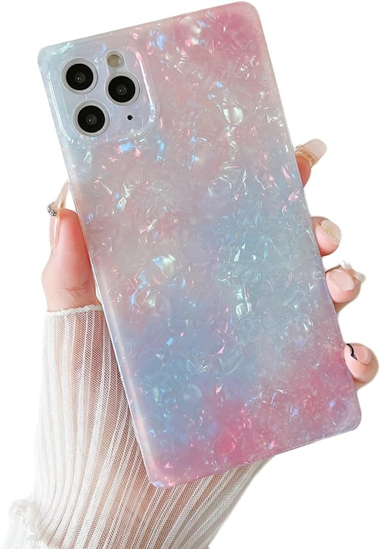 This Taylor Swift pearl phone case dupe has the same pink and blue colors from the "Fortnight" music...