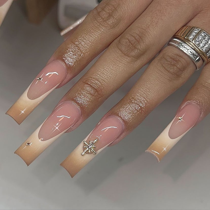 Try caramel latte French tip nails.