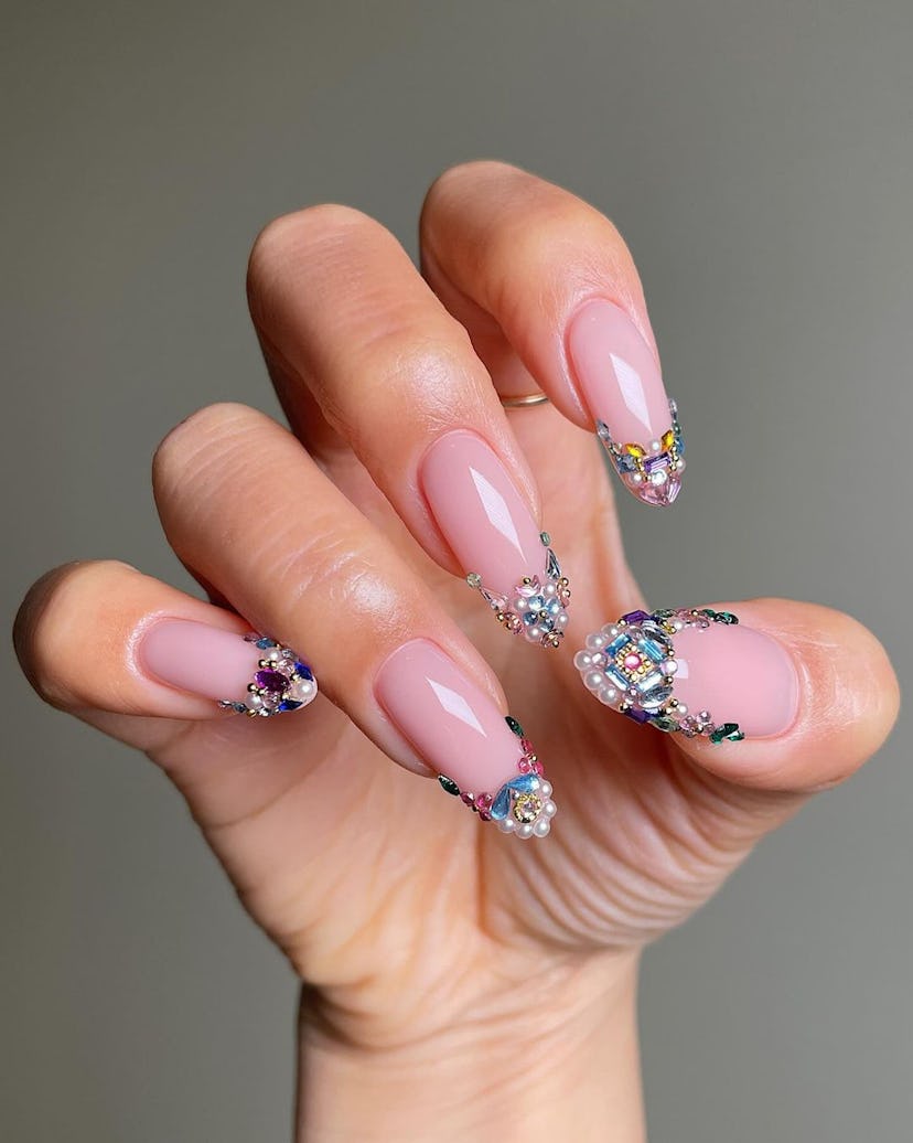 Try bedazzled French tip nails.
