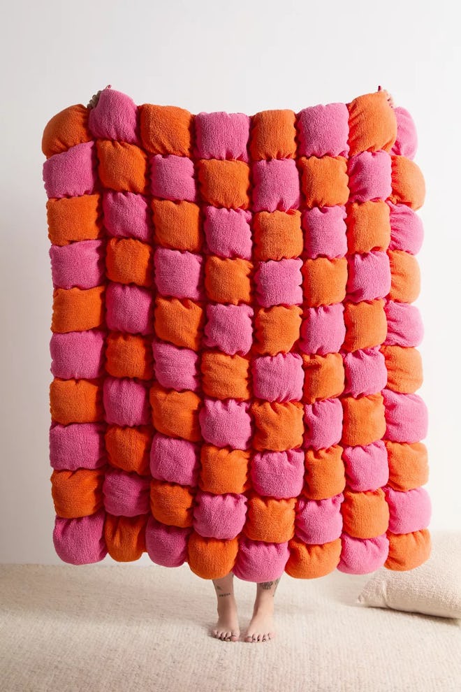 Pink and orange throw blanket, a cozy mother's day gift for bed rotting.