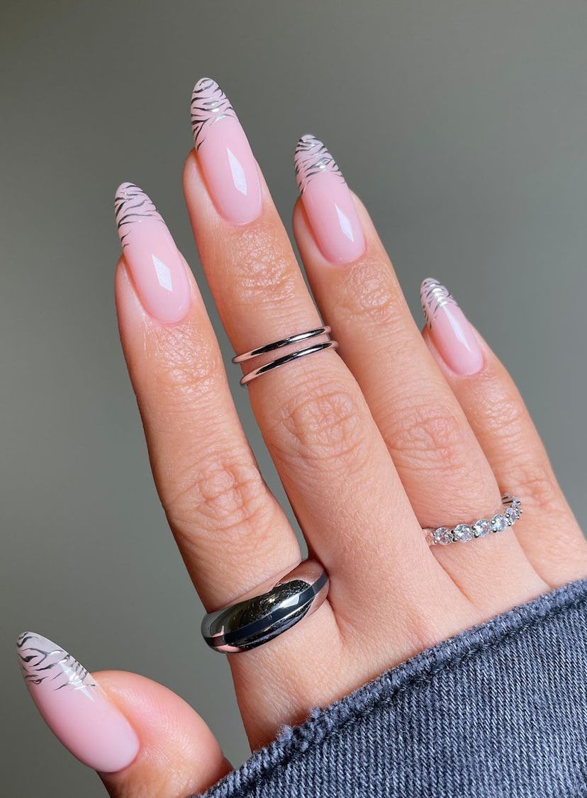 Try minimal zebra print French tip nails.