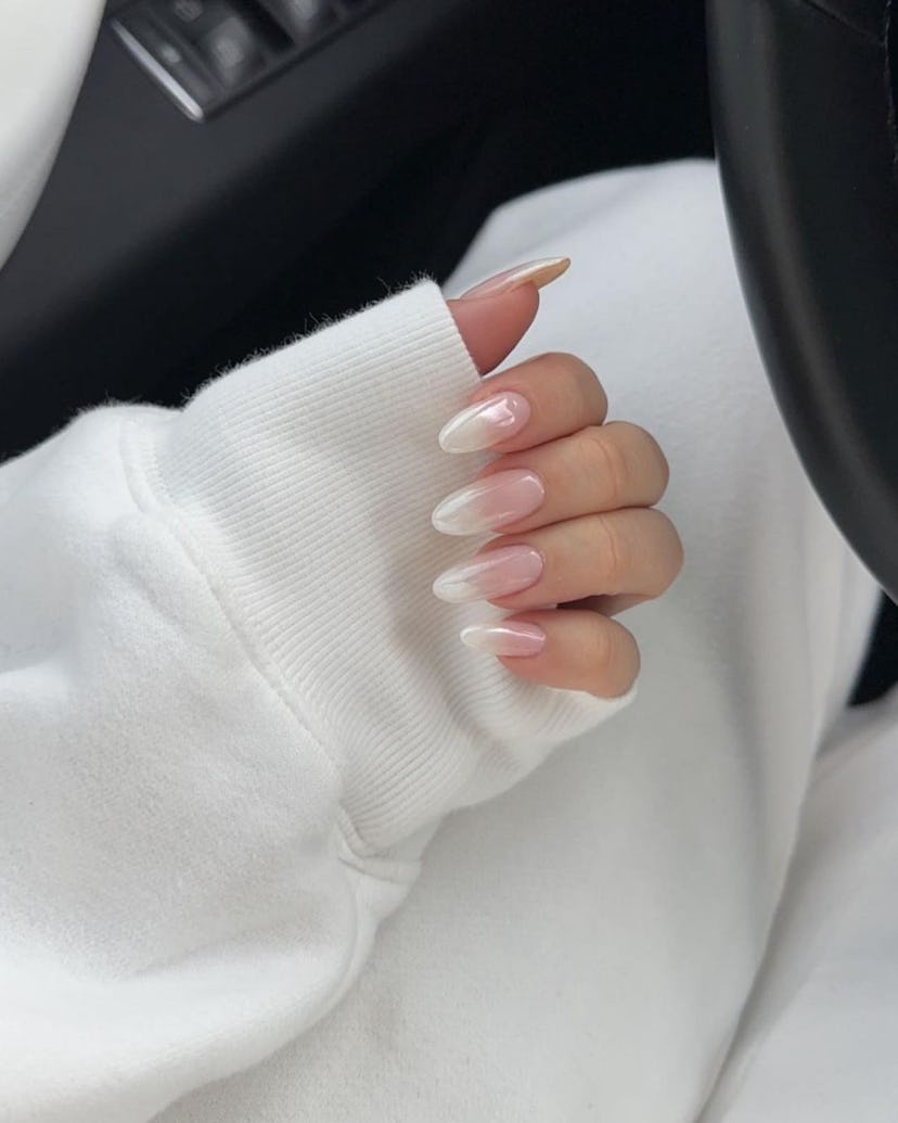 Try glazed donut faded French tip nails.