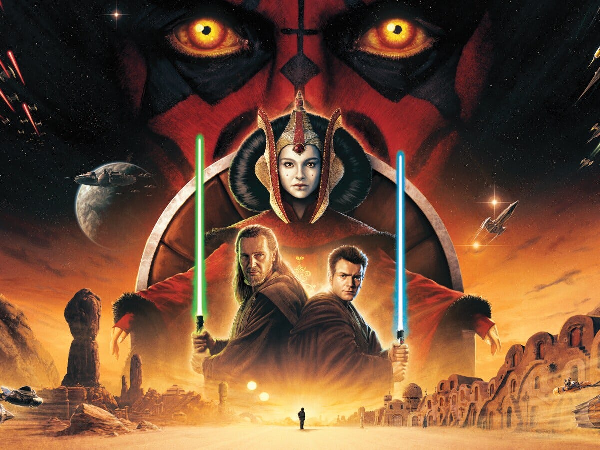 A movie poster with two Jedi holding lightsabers, a large ominous face behind, and spacecraft above ...